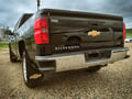 Picture of Truck Hardware Gatorback 12"x23" Black Wrap Gold Bowtie Mud Flaps