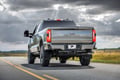 Picture of Truck Hardware Gatorback Black Anodized Ford Oval Offset Mud Flaps - Set of 4 - Fits 2023-2026 Ford F-250/F-350