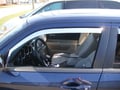 Picture of Putco Element Chrome Window Visors - Kia Forte Sedan - Exterior Tape on application.