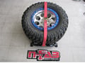 Picture of N-Fab Bed Mounted Tire Carrier - Gloss Black w/Red Rapid Strap - Will Hold A 30-40 in. Tire
